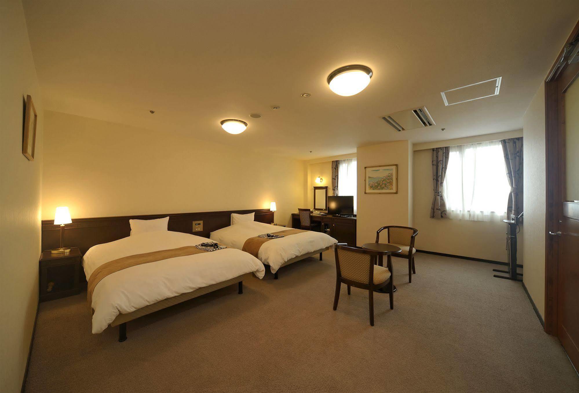 Amami Sunplaza Hotel Exterior foto